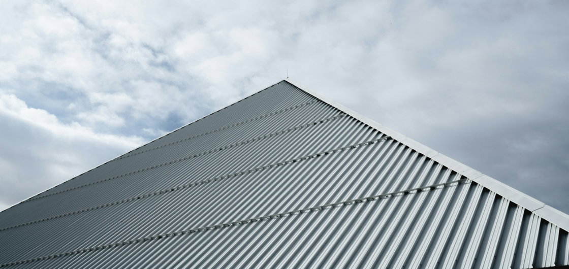 white-building-under-white-clouds-during-daytime.jpg white building under white clouds during daytime