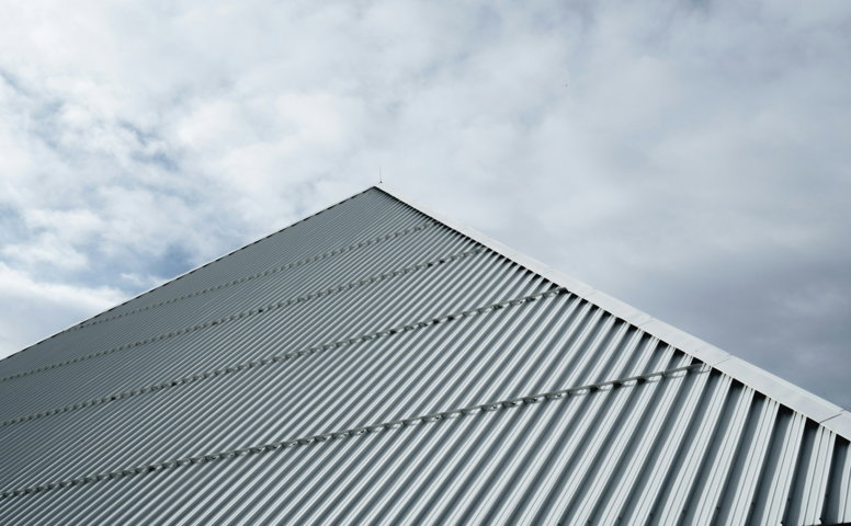 white-building-under-white-clouds-during-daytime.jpg white building under white clouds during daytime